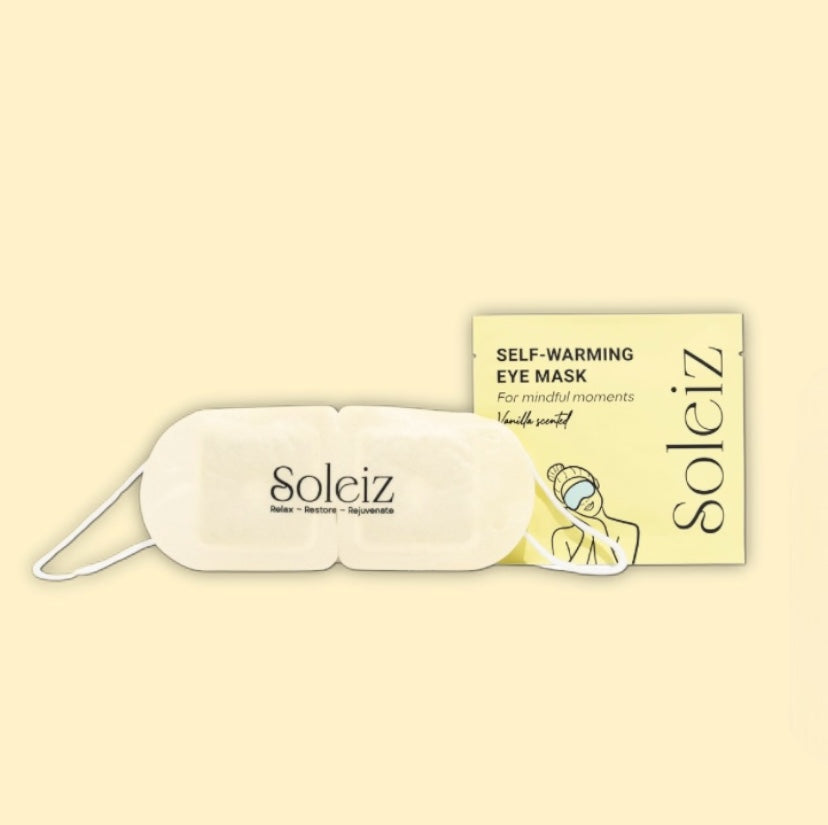 Soleiz self warming eye mask on pale yellow background.