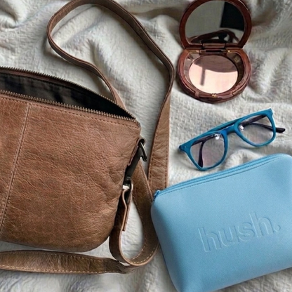 Period kit next to hand bag