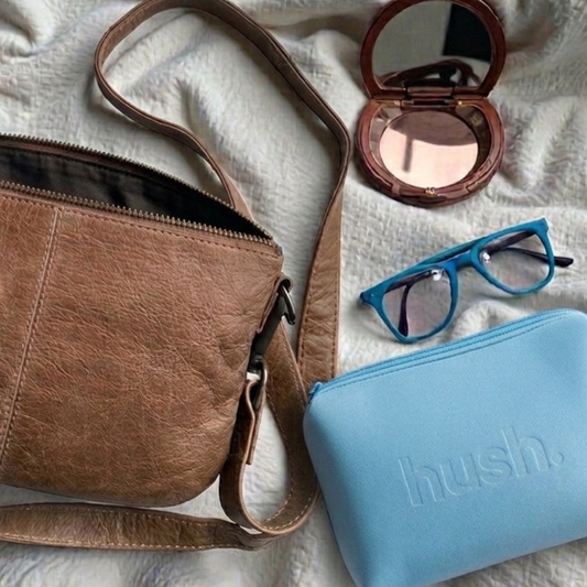 Period kit next to hand bag