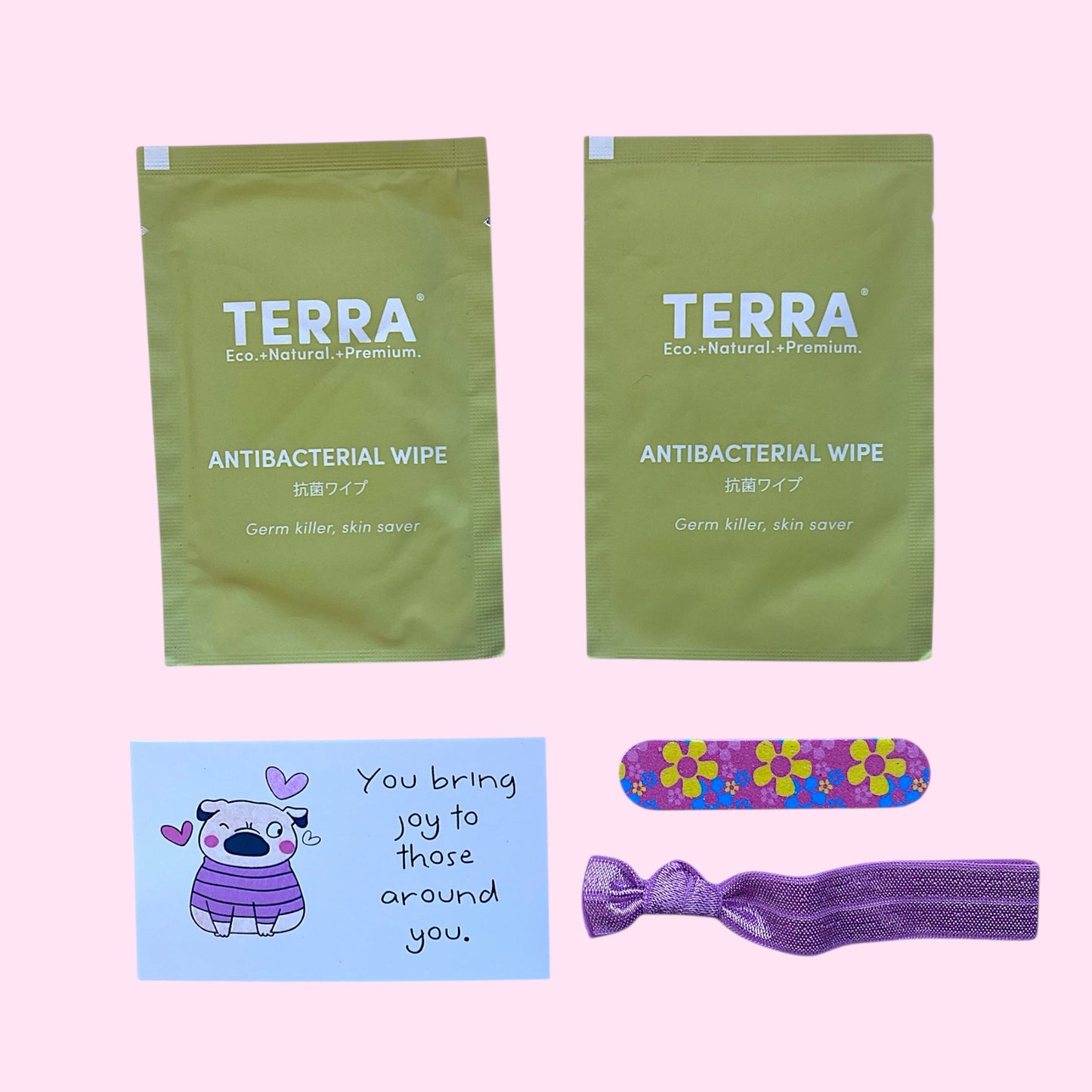Antibacterial wipes, nail file and hair tie for our period kit for NZ girls