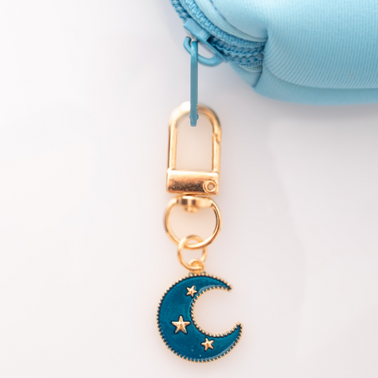 Blue moon bag charm on blue hush bag