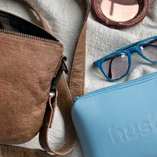 Period kit next to hand bag